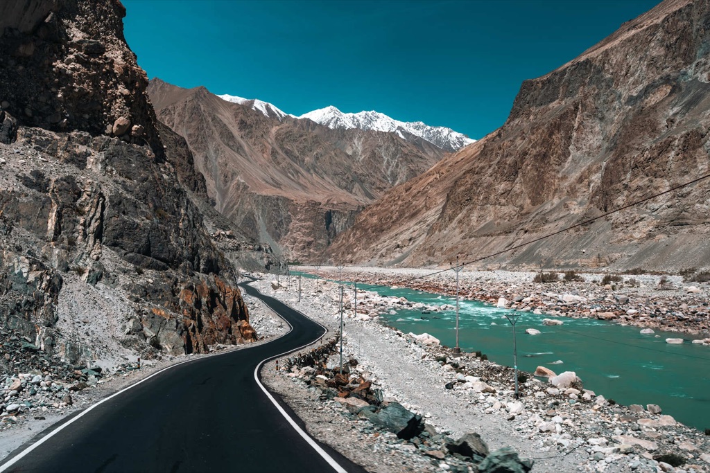 A road crossing high, bare mountains in Ladakh.