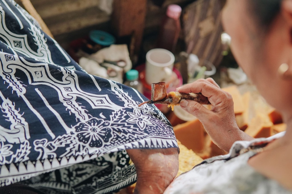 A batik maker at work in Yogyakarta.